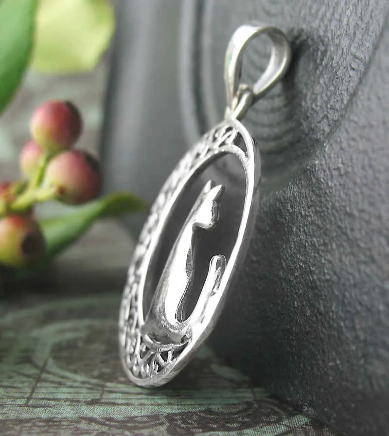 Cat Silhouetted Against a Fanciful Crescent Moon Pendant