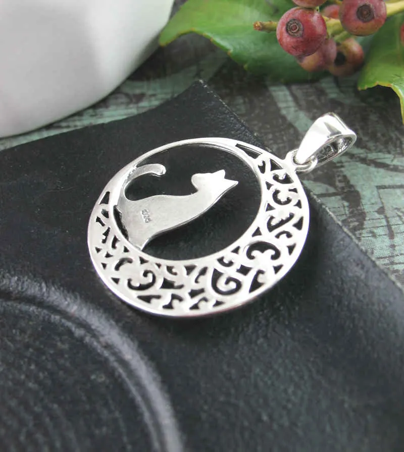 Cat Silhouetted Against a Fanciful Crescent Moon Pendant