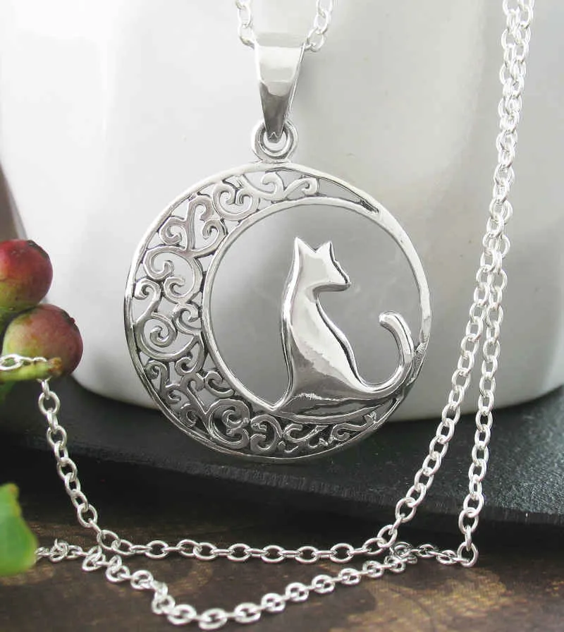 Cat Silhouetted Against a Fanciful Crescent Moon Pendant