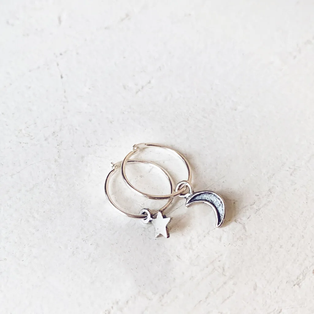 solasta // teeny tiny sterling silver star and crescent moon hoop earrings