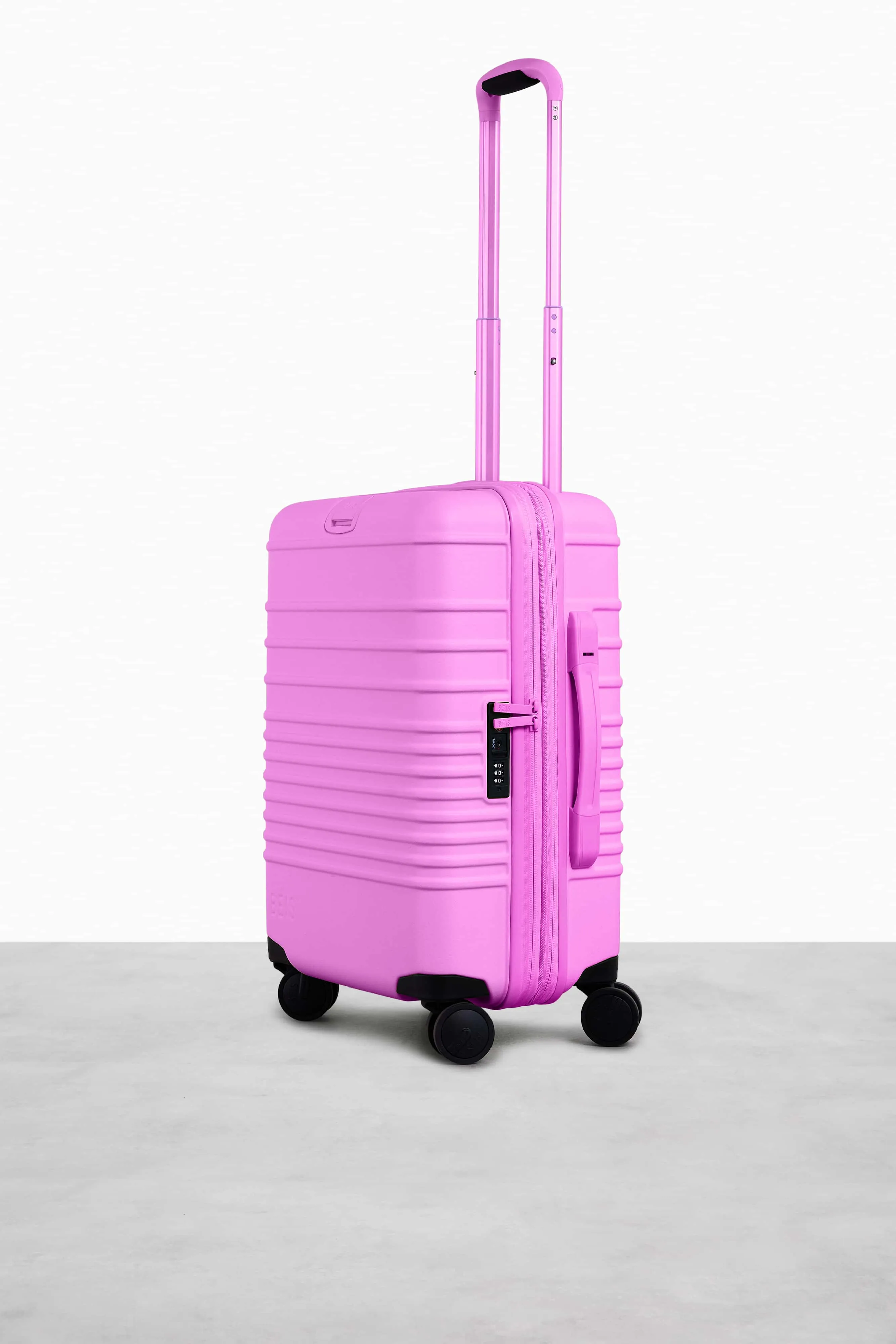 The Carry-On Roller in Berry